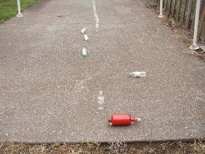 Bare tank blast zone.  I held the tank a little high and missed the closest bottle.  Valve outlet is 1 inch.