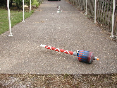 This tennis ball barrel did much better with an obvious slow moving blast that slowly tumbled bottles as it rolled down the line.  It barely knocked over the can at 15 feet.