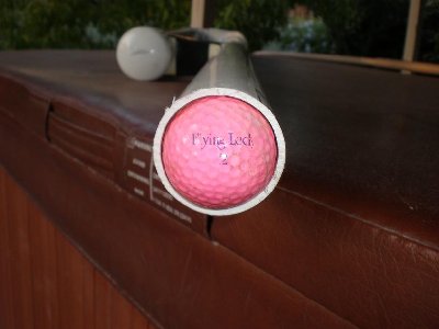 How nicely golf balls fit in the barrel.