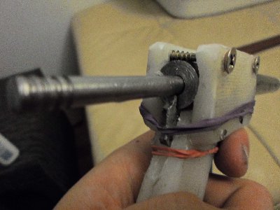 The trigger mechanism locks onto a groove in the rod when the rod is pulled back