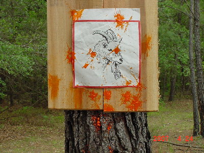 DSC00222.JPG (346.12 KiB) Viewed 6333 times spead pattern of my 24 rd. shotgun load(I accidently aimed a little low)