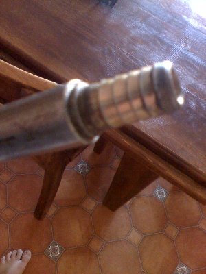 here is the barrel with the piece fitted if i decide to keep this i will run a weld around it . the only reason i was thinking of using this piece was so i could put a hose on the end and use those little clamps to hold it